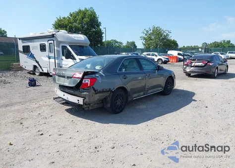 2012 Toyota Camry Le z USA, uszkodzony, nr VIN 4T4BF1FK8CR207675